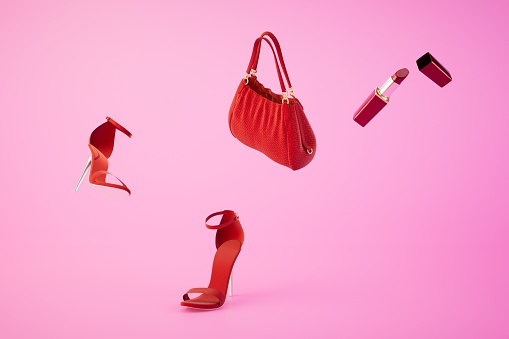 open red lipstick, red handbag and red heeled shoes on a pastel background. 3D render.