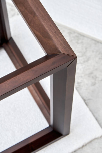 istock Wooden frame of bedside table made of solid walnut in workshop closeup 1481005525
