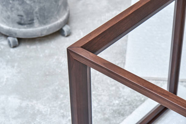 istock Wooden frame of bedside table made of solid walnut in workshop closeup 1481005703