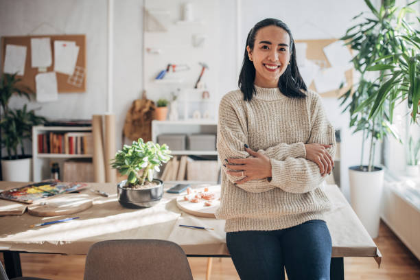 istock Woman in home workshop 1481012136