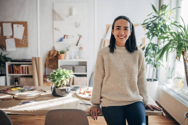 istock Woman in home workshop 1481012170