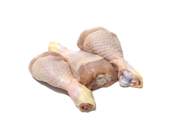 istock Raw chicken thighs, isolated on a white background. 1481012480
