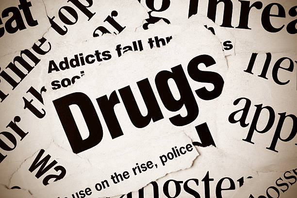 istock Newspaper headlines featruing articles about drugs 148101457