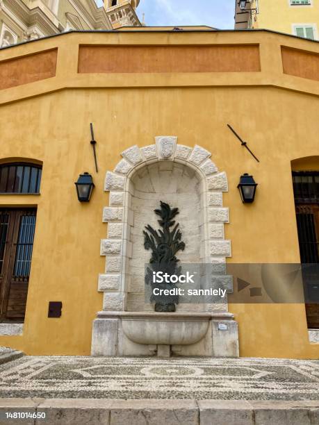 France Côte Dazur Menton Wall With A Fountain In The Old Town Stock Photo - Download Image Now