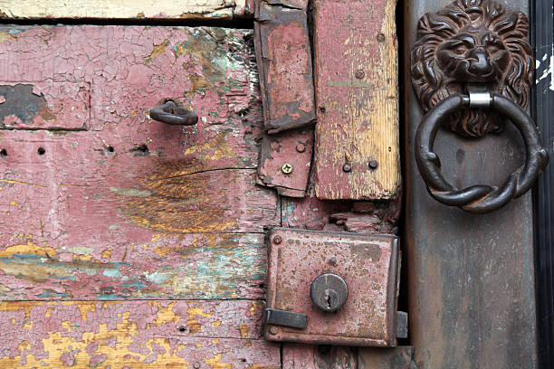 istock Old Door with Metal Lock and Lions Head Knocker 148101894