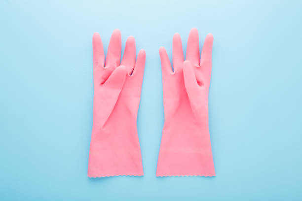 female-pink-rubber-protective-gloves-on-light-blue-table-background-closeup-top-down-view.jpg?s=612x612&w=0&k=20&c=nyZI2cGtN7DqaFxY7P5EjDv0Hp1nWplKjrf007hk6Ho=