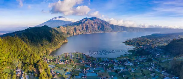Panoramic landscape of Batur lake sitting in a volcanic caldeira and situated in North Bali in Indonesia.