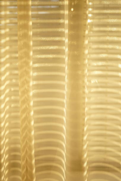 istock Sunny organza tulle with golden sunlight 1481023057