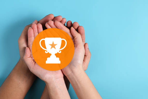 Hands with trophy of winner award icon, Virtual reality and win