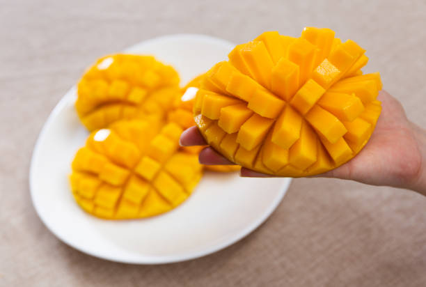istock Pieces of ripe mango served on platter 1481023993