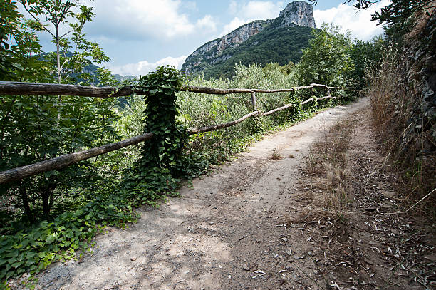 Via Romana's Path Via Romana's path on Rocca di Corno's way viewed on background finale ligure stock pictures, royalty-free photos & images