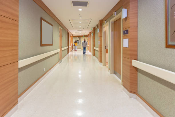 istock Blurred people walking in hospital 1481028340
