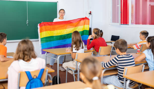 istock Teacher explaining lesson about LGBTQ people to pupils 1481031813