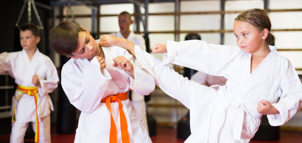 istock Kids on karate training in gym 1481032810
