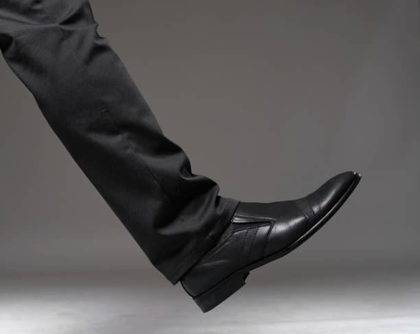 istock Leg of a man in suit 1481036003