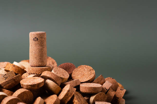 Recycling symbol and wine cork for secondary use. Preservation of the ecology of the planet. Raw materials for reuse. Environmental Protection.