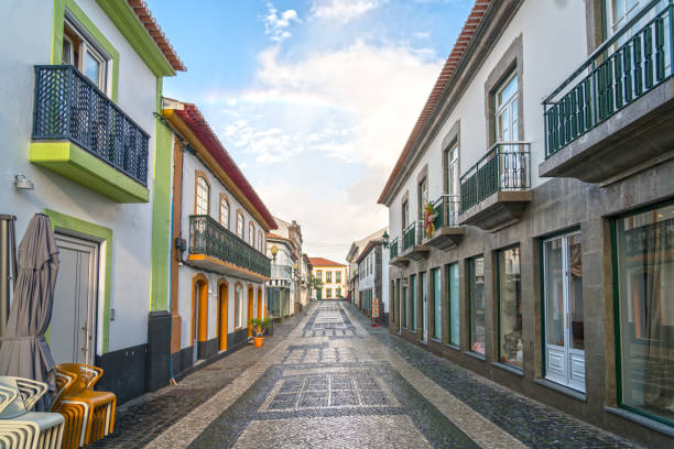 Praia da vitoria - empty street early in the morning Cobble stone street, no people, picturesque town on island Terceira, Praia da vitoria, Azores san miguel portugal stock pictures, royalty-free photos & images