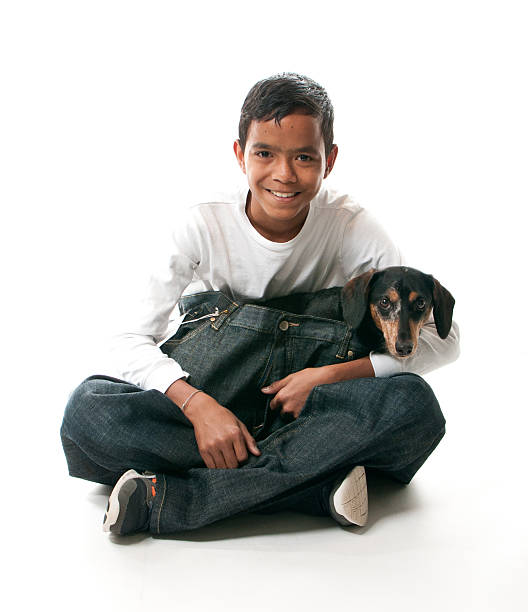Boy with Small Dog stock photo