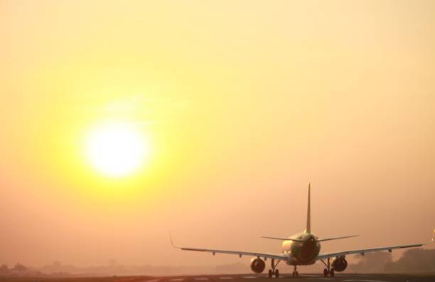 istock An airplane before taking off in the morning with sunrise background 1481053370