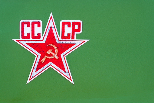 worn, soviet, communist, symbol, green background