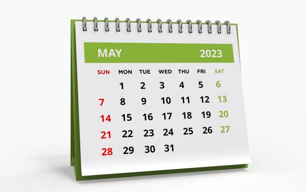 istock Standing Desk Calendar May 2023. 1481054254