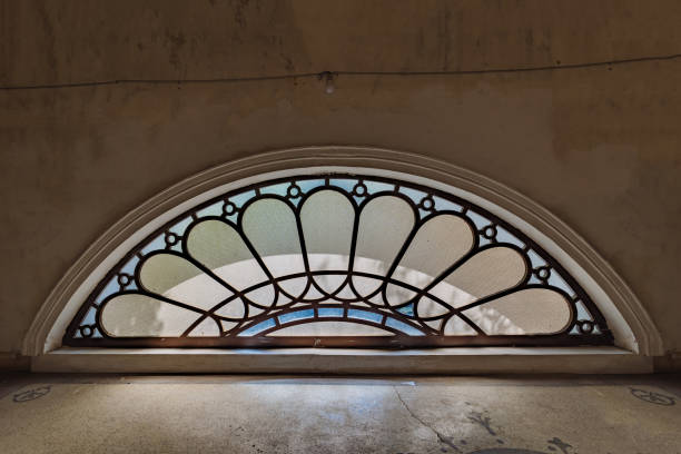 istock Round stained glass window in old abandoned castle 1481054257