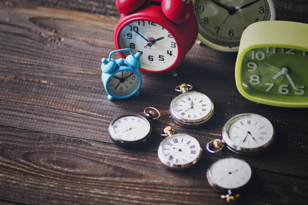 istock pocket watch and alarm clock 1481058603