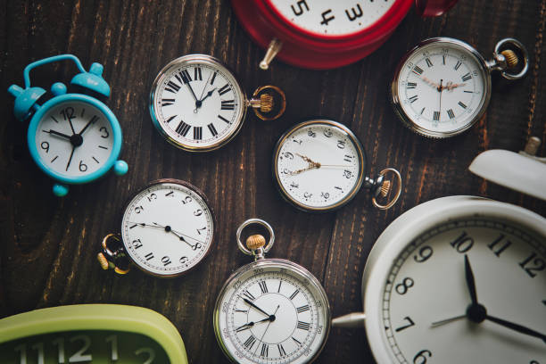 istock pocket watch and alarm clock 1481058611