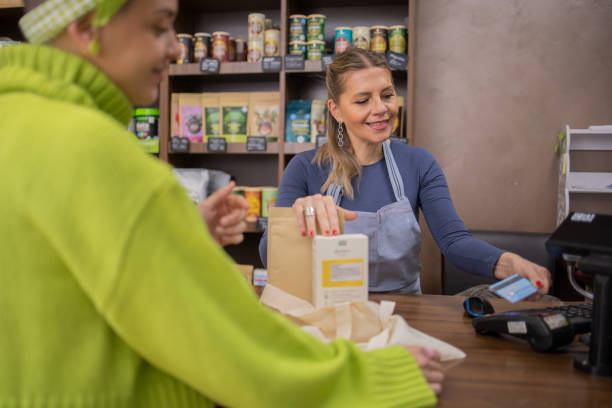istock Smiling young female deli owner 1481065059