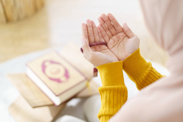 Muslim woman praying.