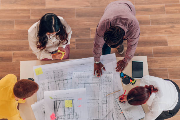 istock Multiracial team of engineers or architects having a meeting in an office 1481071492