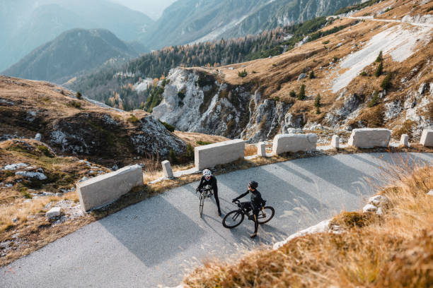 istock Cyclists Enjoying Scenic Ride in Professional Gear 1481076987