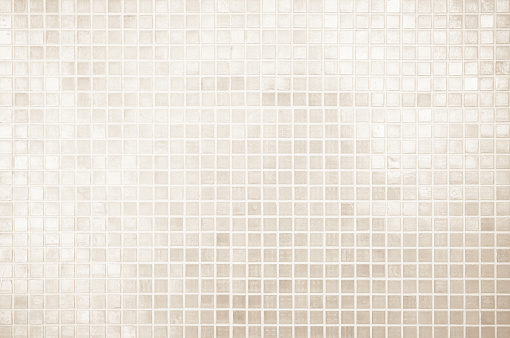 Cream light ceramic wall chequered and floor tiles mosaic background in bathroom, kitchen. Design pattern geometric with grid wallpaper texture decoration pool. Simple seamless abstract surface clean.