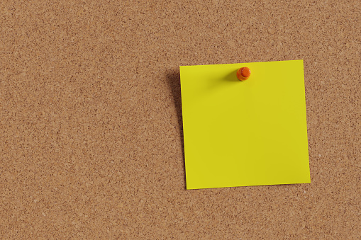 Yellow square note on corkboard. 3d rendering