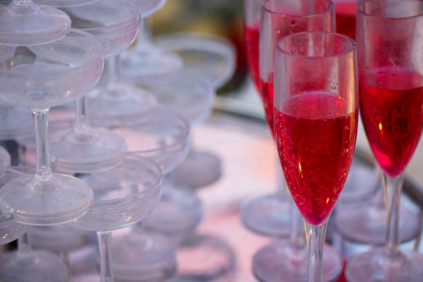 istock Red wine pouring into glasses on the table. 1481089469