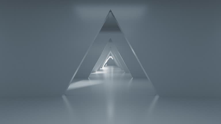 An endless tunnel of triangular shape, the camera flies forward