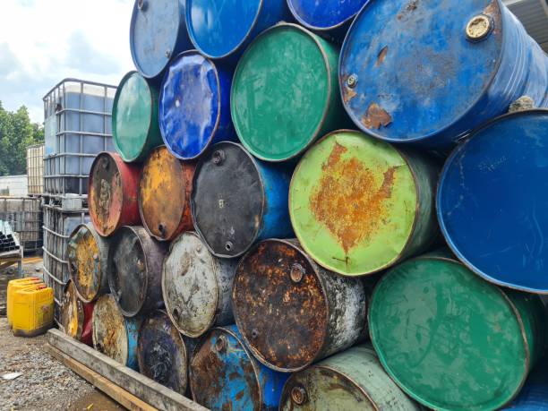 istock a pile of rusty iron drums used for oil packaging 1481102979