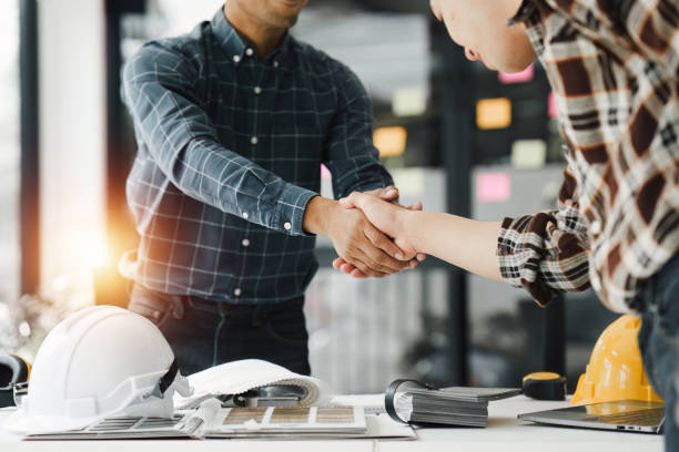 istock Foreman or Civil engineer handshake making modern construction. industry professional team and engineer concept 1481104198