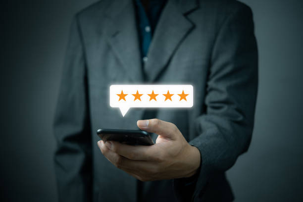 istock Five Star Customer Service Concept for Satisfaction.Businessman holding mobile smartphone for quality feedback related projects, marketing materials, and branding 1481106925