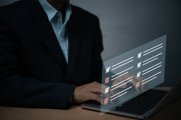 istock man chooses questionnaire with checkbox, survey form online, answer questions in the exam of test business checklist and filling survey form online using technology for education, learning. 1481107064