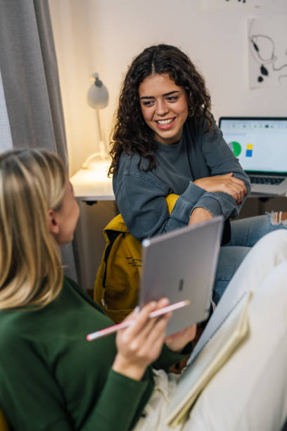 istock two female friends in dorm room 1481108110