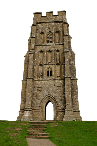 Mature man looks a ancient building on a hill