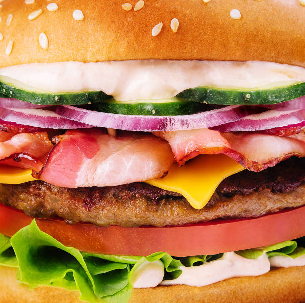 Delicious burger with bacon close up