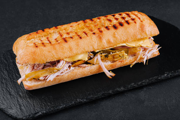 istock Big sandwich with chicken on stone board 1481109626