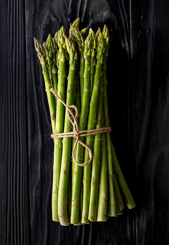 Fresh Organic Asparagus on a Black \
