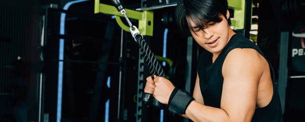 istock Young man performing cable triceps pulldowns to build muscle and strength 1481113073