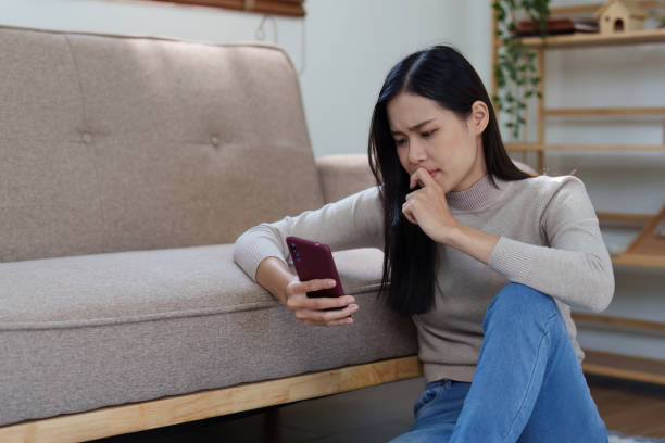 istock Unhappy female overworked and stressed sit at sofa at home. headache, depression feeling exhausted frustrated with bad news, failure at work 1481115348