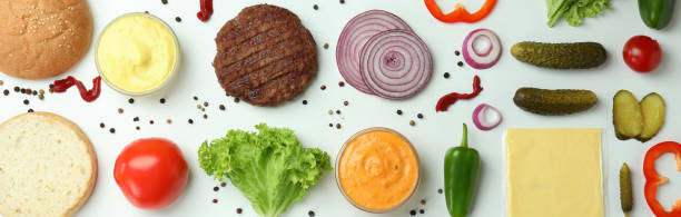 istock Concept of cooking burger on white background, top view 1481115397