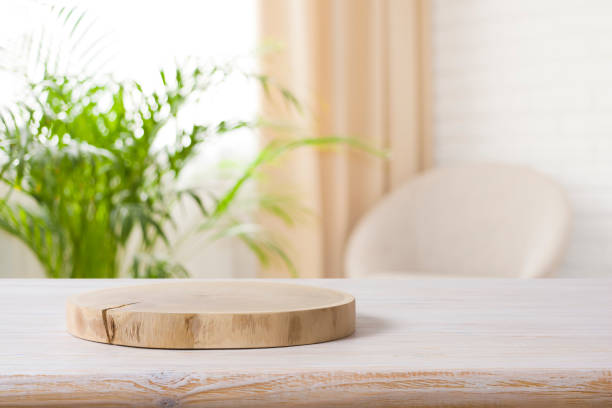 Wooden podium on table in living room interior with space stock photo