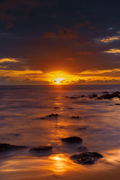 istock Sunrise with scattered rain clouds at the seaside 1481122194
